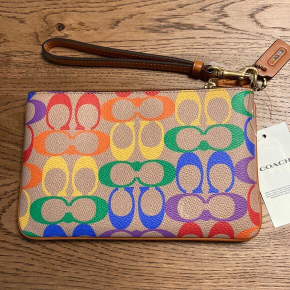 NWT MSRP$99 Coach Small Tan /Multi Wristlet In Rainbow Signature Canvas - Picture 1 of 2
